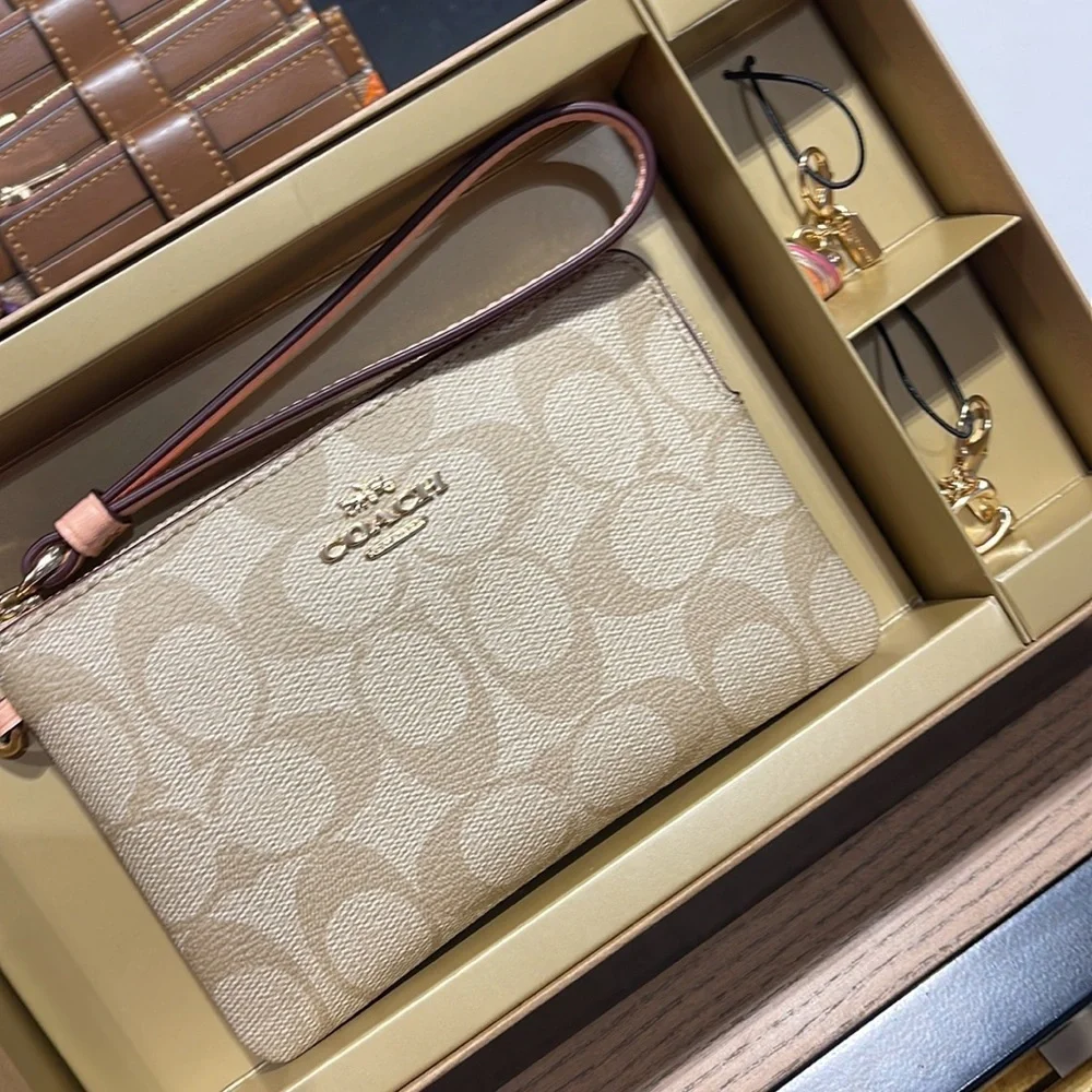 Coach Boxed Corner Zip Wristlet In Signature Canvas Gold/Light Khaki/Faded Blush